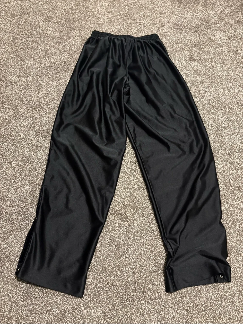 Vintage Nike Black Snap-Button Track Pants with White Swoosh